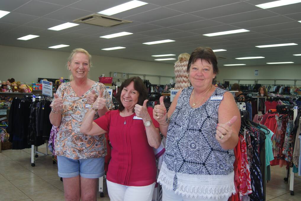 HAPPY DAYS: Browns Plains Vinnies volunteers Jeanne Clarkson and Fran Smith with store manager Lynette Parkin appreciate the money from council. Photo: Jacob Wilson