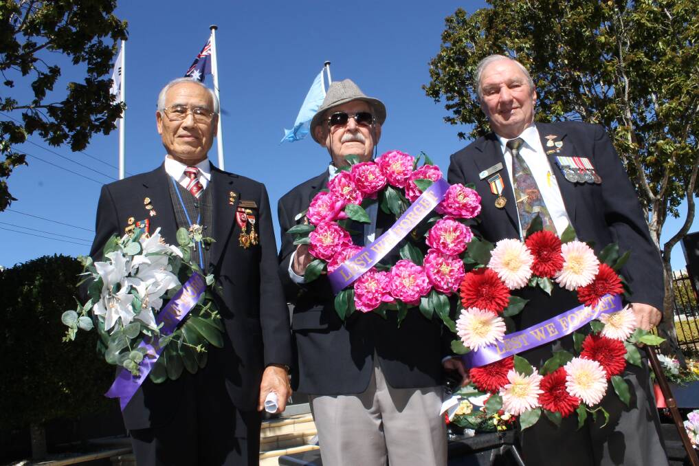 REMEMBER: Paul Kim, Harry Pooley at a previous Korean War Commemoration service.