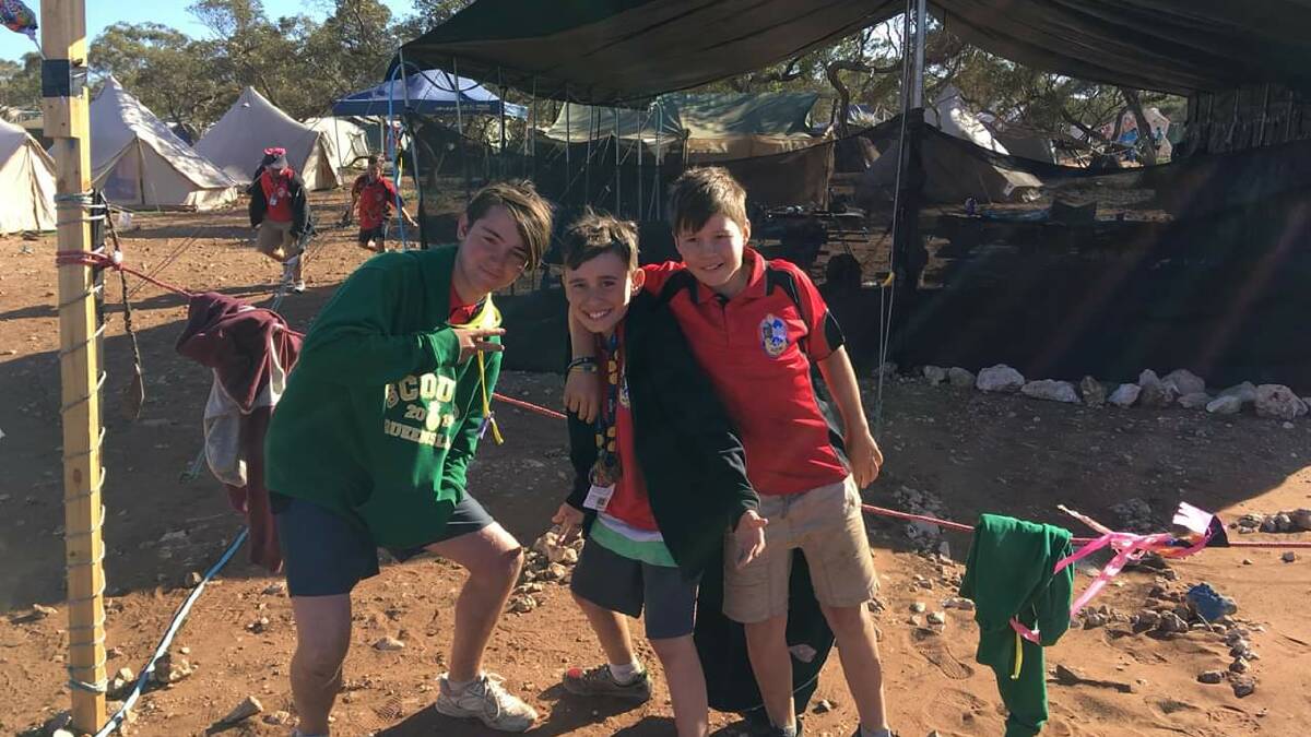 JIMBOOMBA MATES: Jimboomba Scouts members Daniel Giddings, Harrison Whittaker and Hannah Sue-See at their South Australia Jamboree camp. 