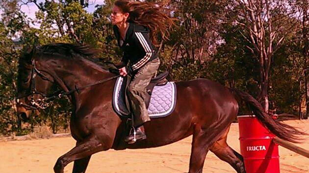 BETTER DAYS: Charmaine Maguire and her horse. Photo: Supplied