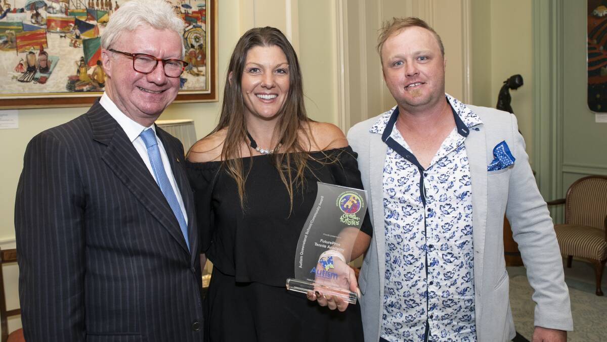 COMPASSIONATE COACHING: Queensland governor Paul de Jersey with FuturePros Tennis Academy coaches AJ Linder-Thompson and Kiel Linder. Photo: Supplied