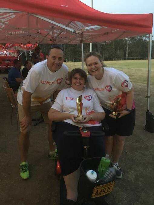 Multiple Sclerosis Queensland ambassadors Charlie and Jenny Bennett with Greenbank campaigner Penelope Miller at the Walk 2 Cure MS at Logan in 2017.