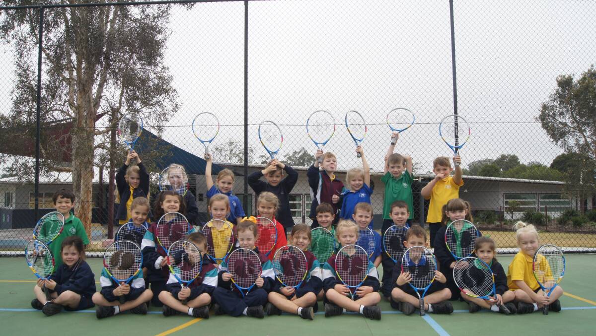 BIG HIT: Emmaus College prep students were excited to receive their free tennis racquets last week. Photo: Jacob Wilson
