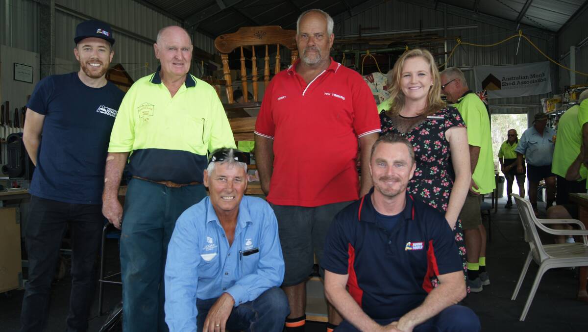 TIMBER: Total Tools owner Peter Daly, Logan Village Men Shed president Ian Bell, Cedar Grove Waste Water Treatment Plant site superintendent Darryl Kretschmar, Terry Gresham from Tex Timbers, Guy Gram from Total Tools and Cr Laurie Koranski. Photo: Jacob Wilson 