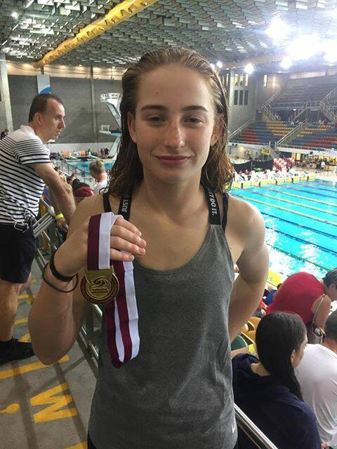 GOLDEN PERFORMANCE: Greenbank swimmer Mollie O'Callaghan achieved personal best times in all her events at the Queensland State Swimming Championships from December 15 to 21. 