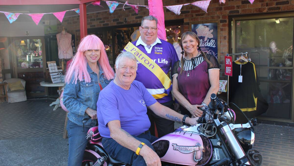 RELAY: Donna Tunbridge, David Kenny, Wright MP Scott Buchholz and Camille Costin prepare for the Jimboomba Relay for Life ceremony on October 12. 