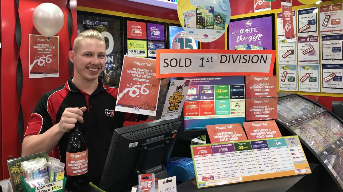 CASH PRIZE: Tobacco Station Eagleby employee Jack Rouw celebrates a customer winning more than $250,000 in the Super 66 draw.