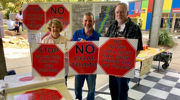 OPPOSED: Inland Rail Action Group members Suz and Stan Corbett with Saint Stephens School principal and Inland Rail Community Consultative Committee member Phil Manitta. 
