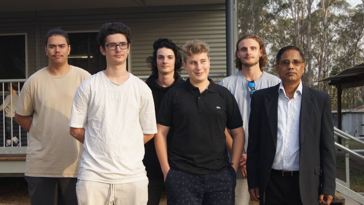 GRADUATES: Australian Technology and Agricultural College students Javier Newton, Drew Morrison, Xander Young, Andrew Smith and Oliver Walker with Narendra Nand. Photo: Jacob Wilson