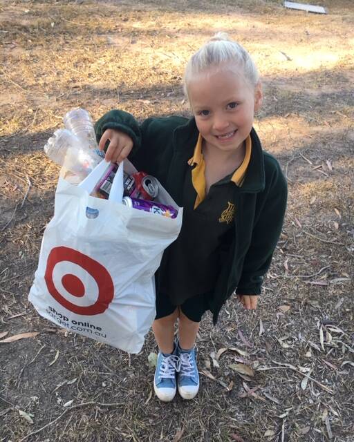 RECYCLING: Olivia-Grace Collins has been collecting recyclable containers in a bid to help Jimboomba State School afford a new playground. 