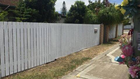 Logan police built a new fence for a 74-year-old Beenleigh resident whose fence was damaged due to a fatality. Photo: Queensland Police