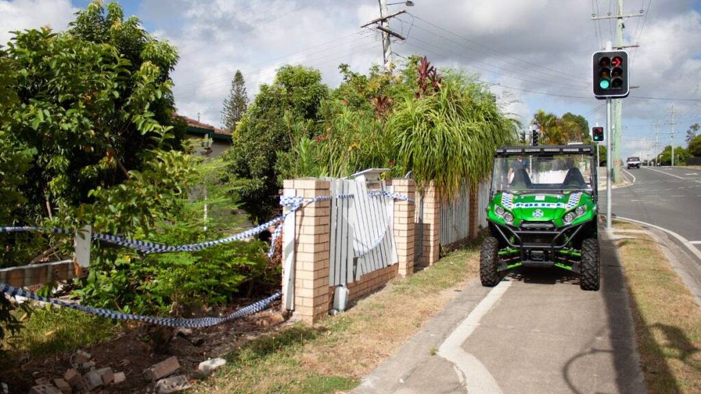 The Milne Street fence damaged from a fatal traffic crash. Photo: Queensland Police
