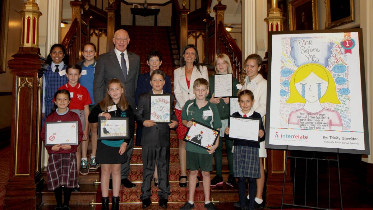 TAKING A STAND: Jessie Jarmey (second on the left in the front row) was awarded highly commended for her submission to Interrelate anti-bullying poster competition. Photo: Supplied