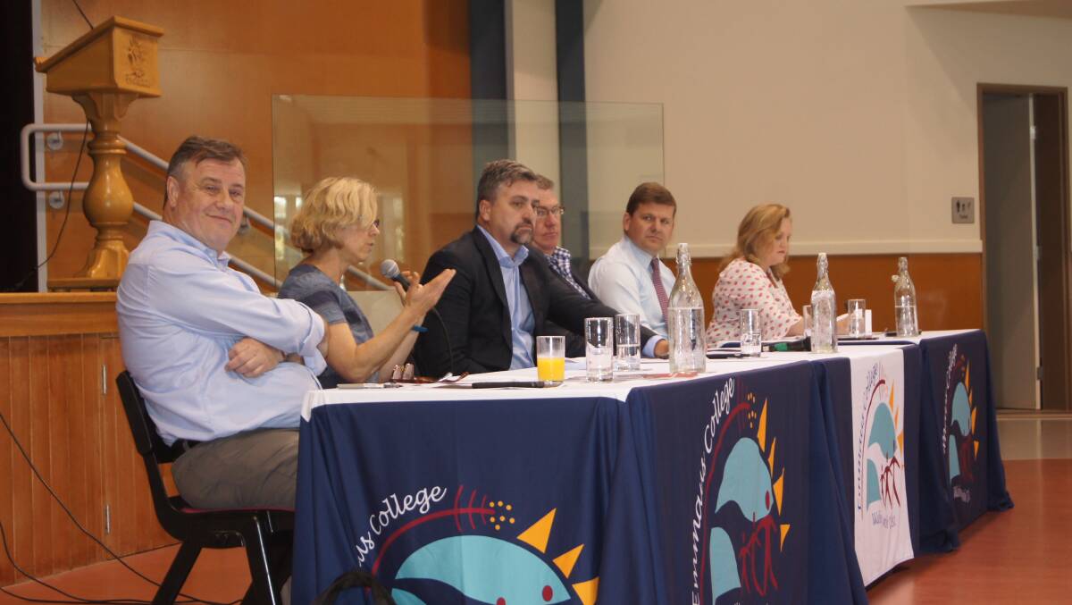 Academics and panelists joined the panel of a political forum at Emmaus College on Tuesday. Photo: Jacob Wilson