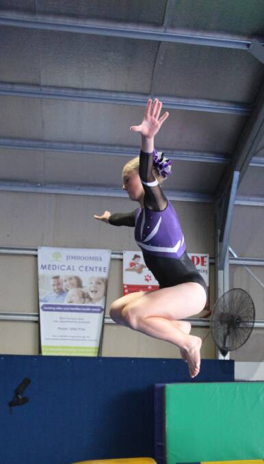 IN THE AIR: Erin Saxelby was named gymnast of the year at the Jimboomba Gymnastics Club after securing good results in all competitive events in 2019. 