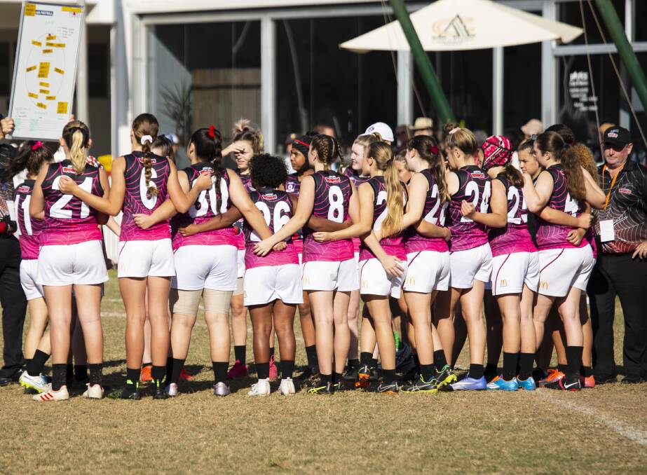 TEAM EFFORT: The under 15 Jimboomba Redbacks girls team have secured their place in the AFL season grand final.