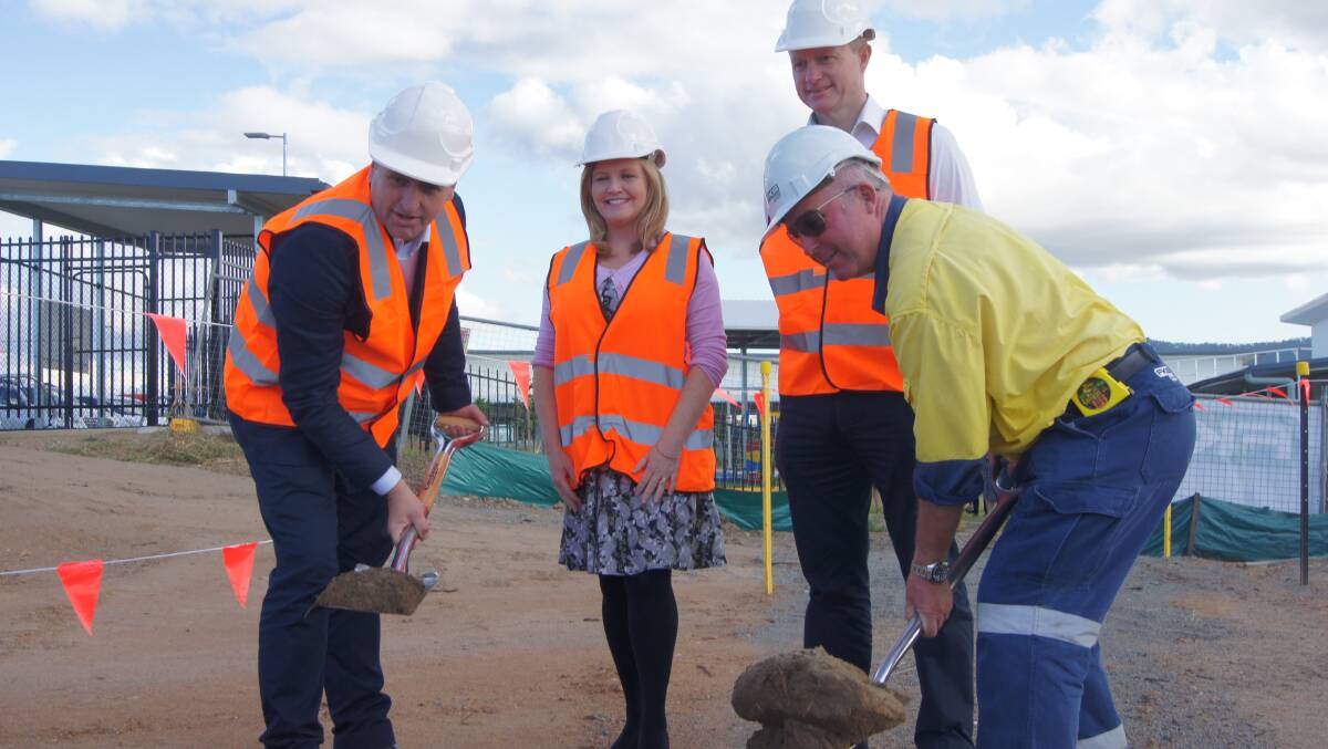 SHOVELS READY: Logan MP Linus Power, councillor Laurie Koranski, operations manager Barry Smith and site manager Steven Allen turn the first sod on the $3.6 million Yarrabilba Community Hub project. Photo: Jacob Wilson