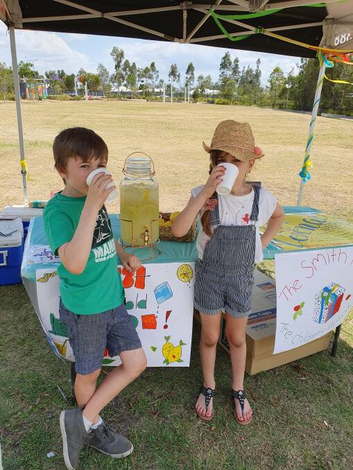 THIRST QUENCHER: Austin and Elizabeth Amour helped raise funds to offer Christmas cheer to vulnerable kids via the Smith Family and Queensland Children's Hospital. Photo: Supplied