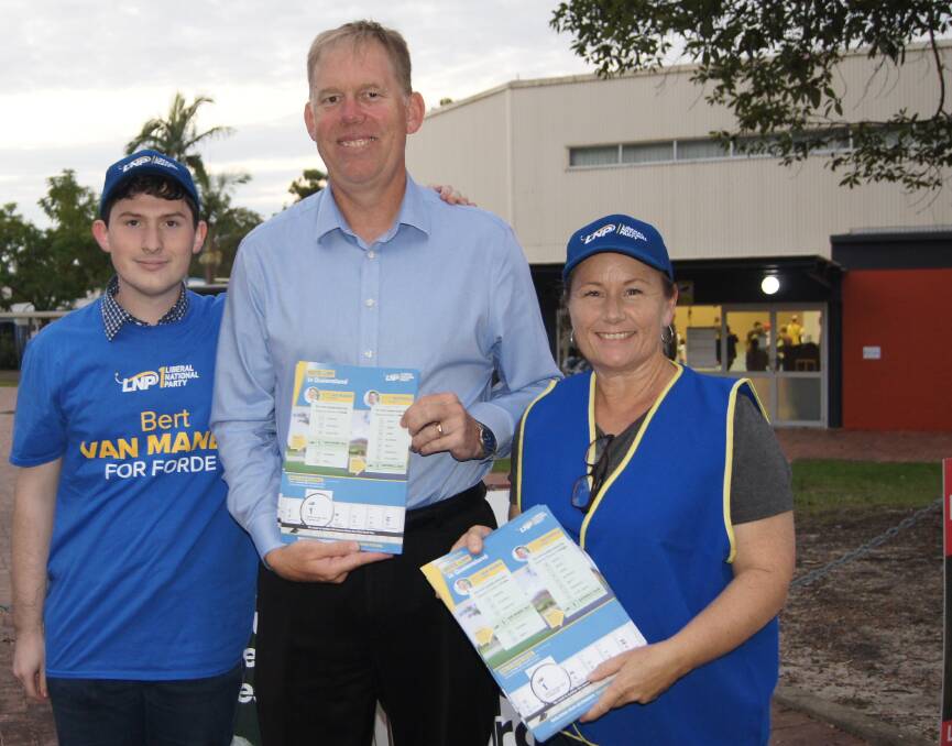 VICTORY: Forde MP Bert van Manen with volunteers James Percival and Jacinta Bryne at Park Ridge during the final minutes of election day. Photo: Jacob Wilson