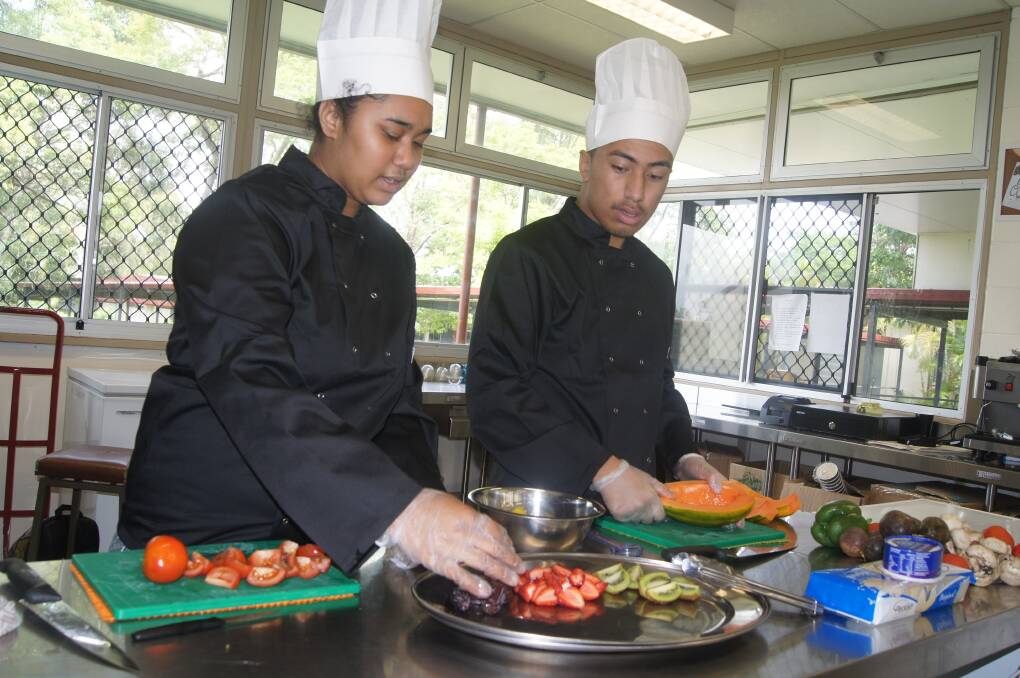 GETTING PREPARED: Marsden State High School hospitality captains Mere Alu and Jay Tanginoa will be among a group of 35 students catering for Delaware North for the Commonwealth Games. Photo: Jacob Wilson
