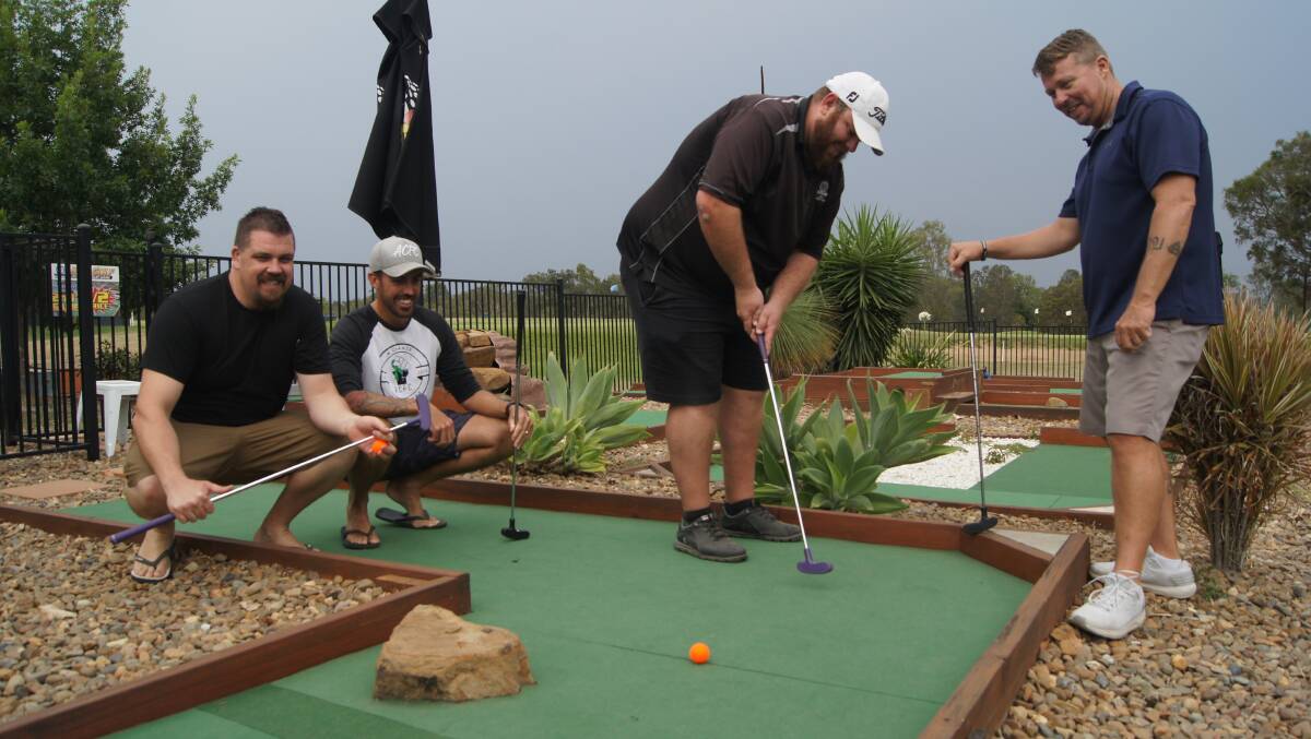  Ben Fitzgerald, Nathan St Ledger, Daniel Hunnisett and Scott Bannan are looking forward to a the free Christmas mini-golf event at Hills Golf Club on December 22. Photo: Jacob Wilson