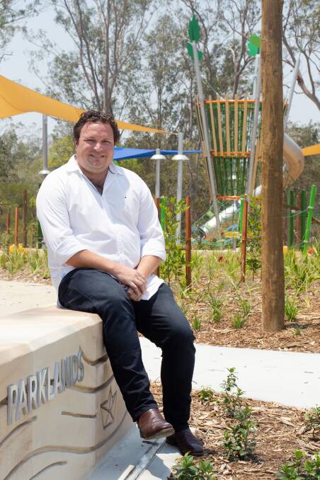 NATURE PLAYGROUND: Orchard Property Group development director Ted Cronin at the recently constructed $3million Pebble Creek Parklands. 