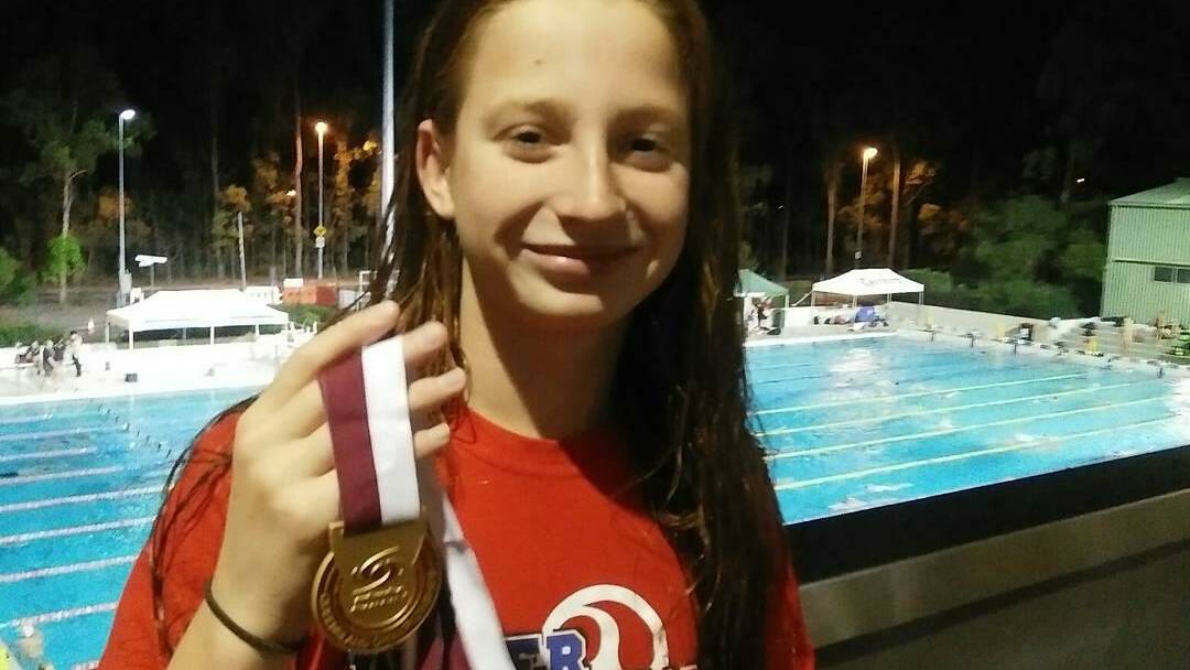 YOUNG CHAMPION: Mollie O'Callaghan achieved sixth place in Australia for 50-metre backstroke at the Commonwealth Games trials. Photo: Supplied