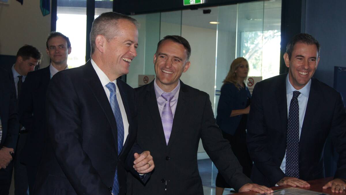 ANNOUNCEMENT: Opposition leader Bill Shorten, Labor candidate for Forde Des Hardman and Rankin MP Jim Chalmers during a previous visit to the Forde electorate. Photo: Jacob Wilson