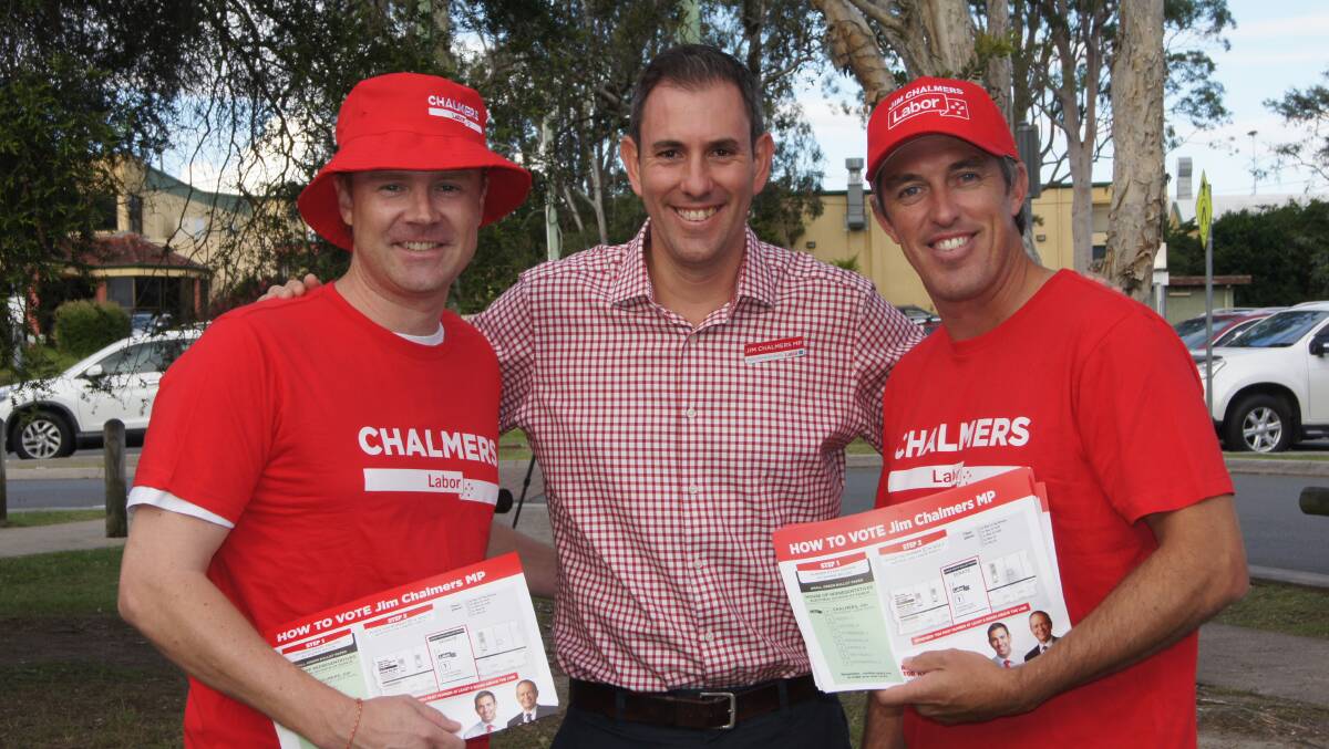 ELECTION DAY: Labor member for Rankin Jim Chalmers with volunteers Michael B. Graves and Gareth Keating. Photo: Jacob Wilson