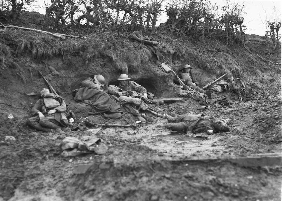 CONFRONTING: Photographers Frank Hurley and George Wilkins saw these dead and wounded Australians in a railway cutting near Broodseinde Ridge on October 12, 1917. Picture: AWM E03864