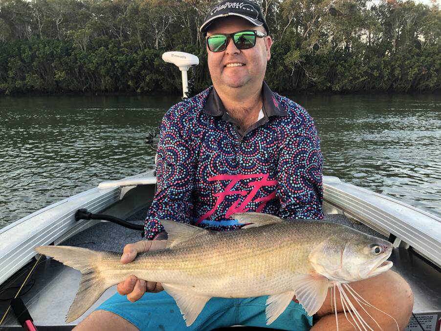 SUPER SALMON: Kane Keeble with a threadfin salmon caught in the Brisbane River.