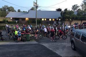 Beginning: The start line of last years inaugural 100km ride outside the Jimboomba Community and District Hall. Picture: Supplied. 
