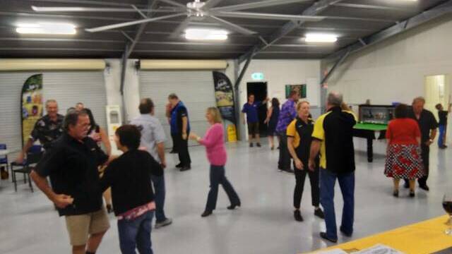 GOOD TIMES: Members enjoy a dancing class at the Rods Inc clubroom. 