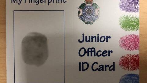 KEEPSAKE: The children had a ball creating their very own Junior Officer ID Cards featuring their unique fingerprint.