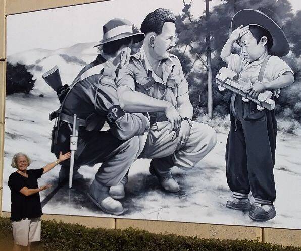 FAMILY TIES: Janette Siebel at the Remembrance Mural, Greenbank.