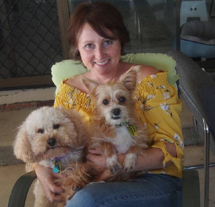 LOVING FAMILY: Annette Thornton-Vincent with Teddy (left) and new friend Elmo. 