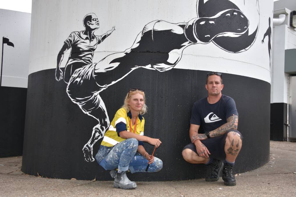 NEW LOOK: Jessie Foreman and artist Jake Arthur have been working on artwork to decorate the tanks at the entrance to the club.