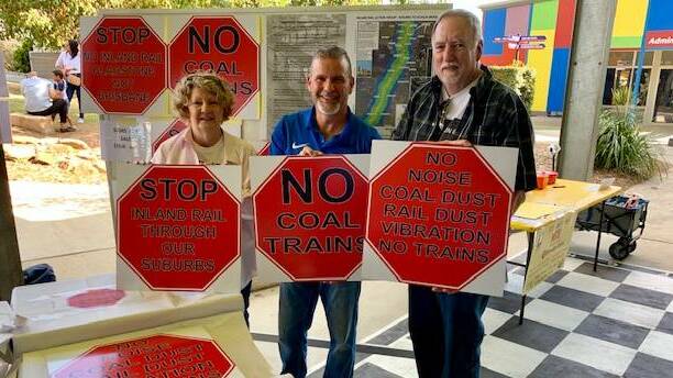 OPPOSED: Inland Rail Action Group members Suz and Stan Corbett with Saint Stephens School principal and Inland Rail Community Consultative Committee member Phil Manitta.