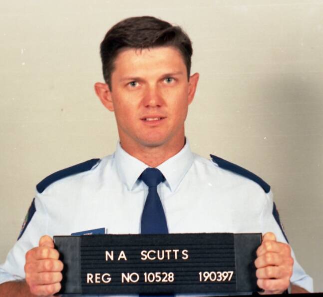 CRACKING THE CASE: Senior Constable Neil Scutts was shot by armed robbers at a Browns Plains bank in 1999.