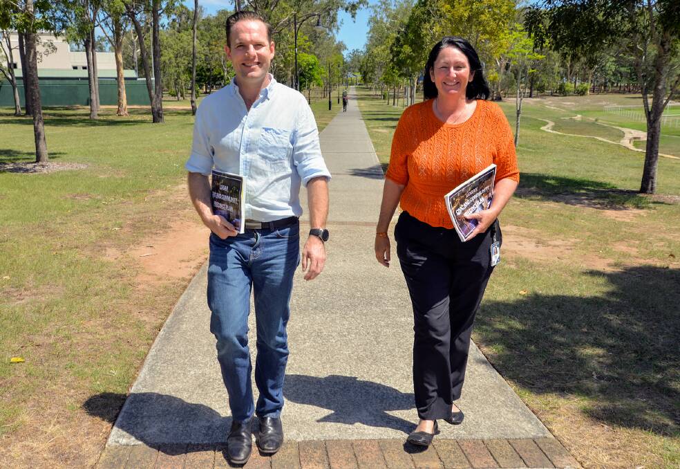 UPGRADES PLANNED: Councillors Jon Raven and Teresa Lane at the entrance to Logan Gardens in Logan Central.