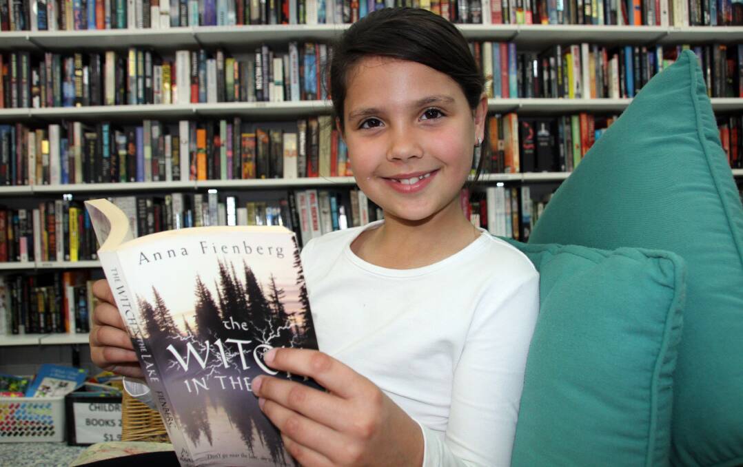 BOOK WEEK: Kaylin Badenhorst, 8, of Wynnum, learns to enjoy books back in 2015.  Photo by Chris McCormack