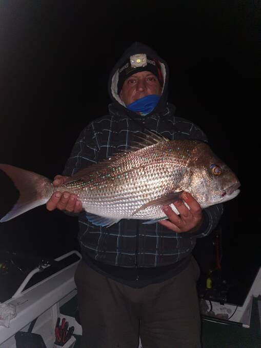 GOOD FISH: Joe Pisano with a bay snapper. The snapper fishery in Queensland is closed for one month.
