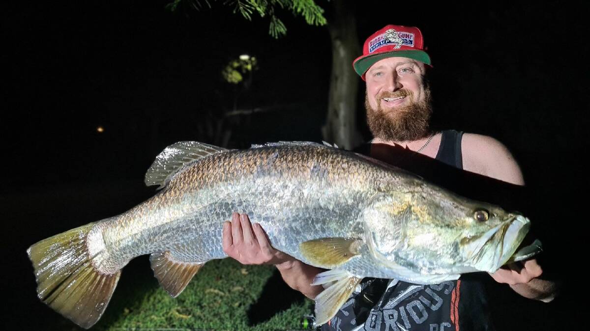 NOT SO CRAZY: Self-confessed "crazy about fishing" Jon Roberts, from Jimboomba, with a whopper barramundi caught on the Gold Coast.
