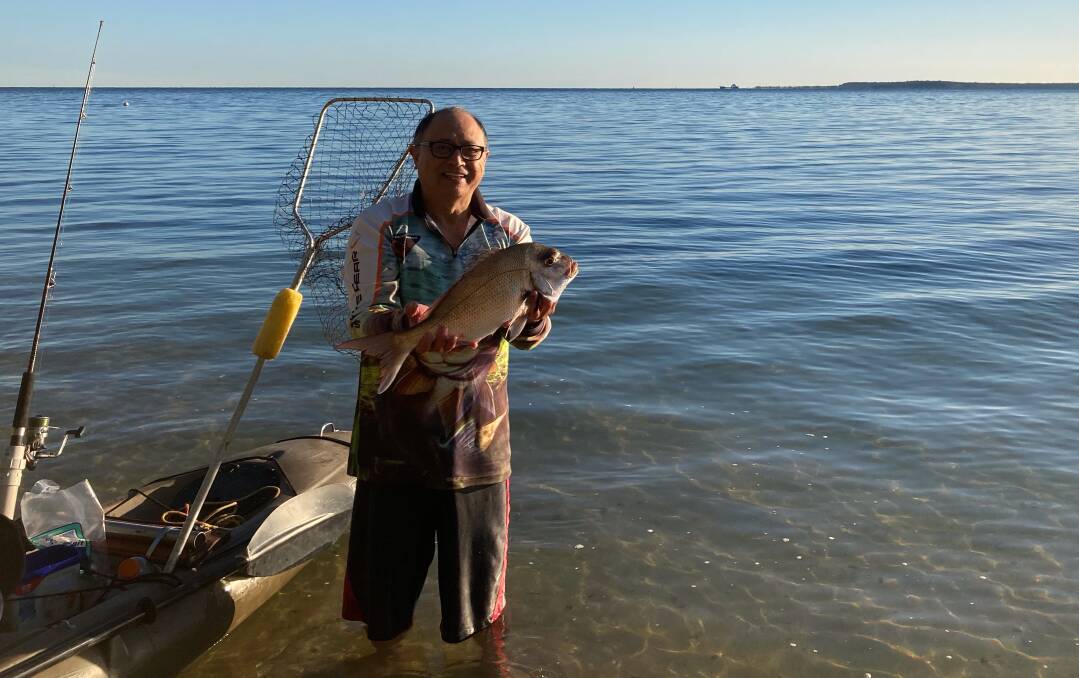 NICE CATCH: Michael des David with a handy snapper caught early in the morning.