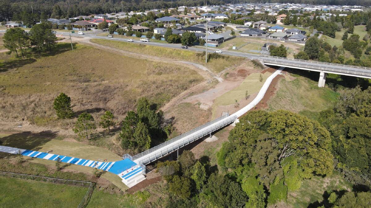 FROM ABOVE: The Logan Village River Link has been opened, providing better access for locals to the village green. Photo: supplied