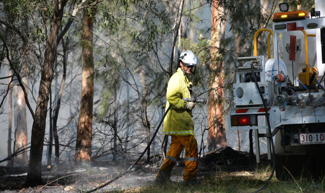 FIRE: Burns are underway in Squirrel Glider Conservation Area near McMillan Road at Alexandra Hills. Photo: Brian Williams