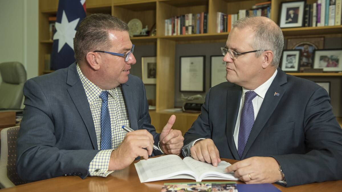 BUCHHOLZ: The federal MP, seen here with Scott Morrison, says access to Centrelink payments has been made easier by relaxed rules.