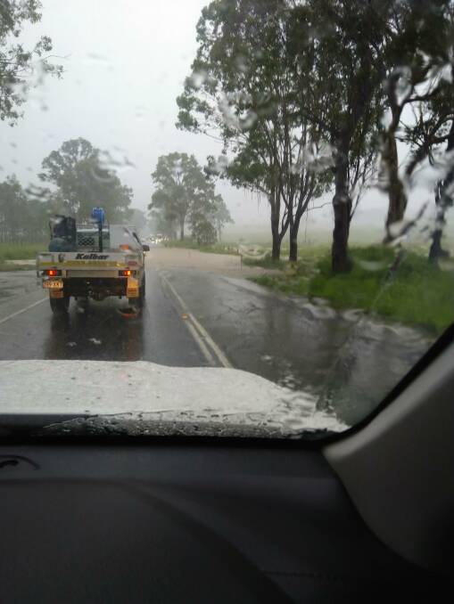DELUGE: Rain over Beaudesert Nerang Road at Tabragalba early this morning.