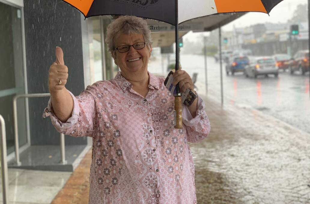 BIT WET: Judy Murphy from Calico Country enjoys the rain at Beaudesert. Photo: Larraine Sathicq