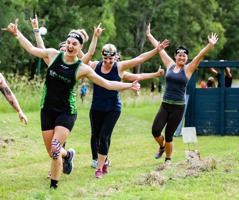 TOUGH TERRAIN: Spartan racers take on the challenge at Peak Crossing. Photo: Supplied